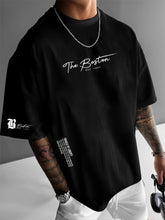 Laden Sie das Bild in den Galerie-Viewer, BAGGY TREND-SHIRT MIT ANGESAGTEN SLOGAN PRINTS - BARBER TRENDS WORLD