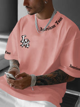 Laden Sie das Bild in den Galerie-Viewer, TRENDY BAGGY LA T-SHIRT - BARBER TRENDS WORLD