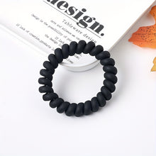 Laden Sie das Bild in den Galerie-Viewer, SPIRAL-HAARGUMMI MATT SCHWARZ – CLEANER LOOK, MAXIMALER HALT - BARBER TRENDS WORLD